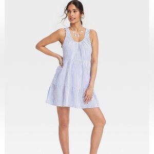 Blue and white striped sleeveless tiered mini sundress with pockets